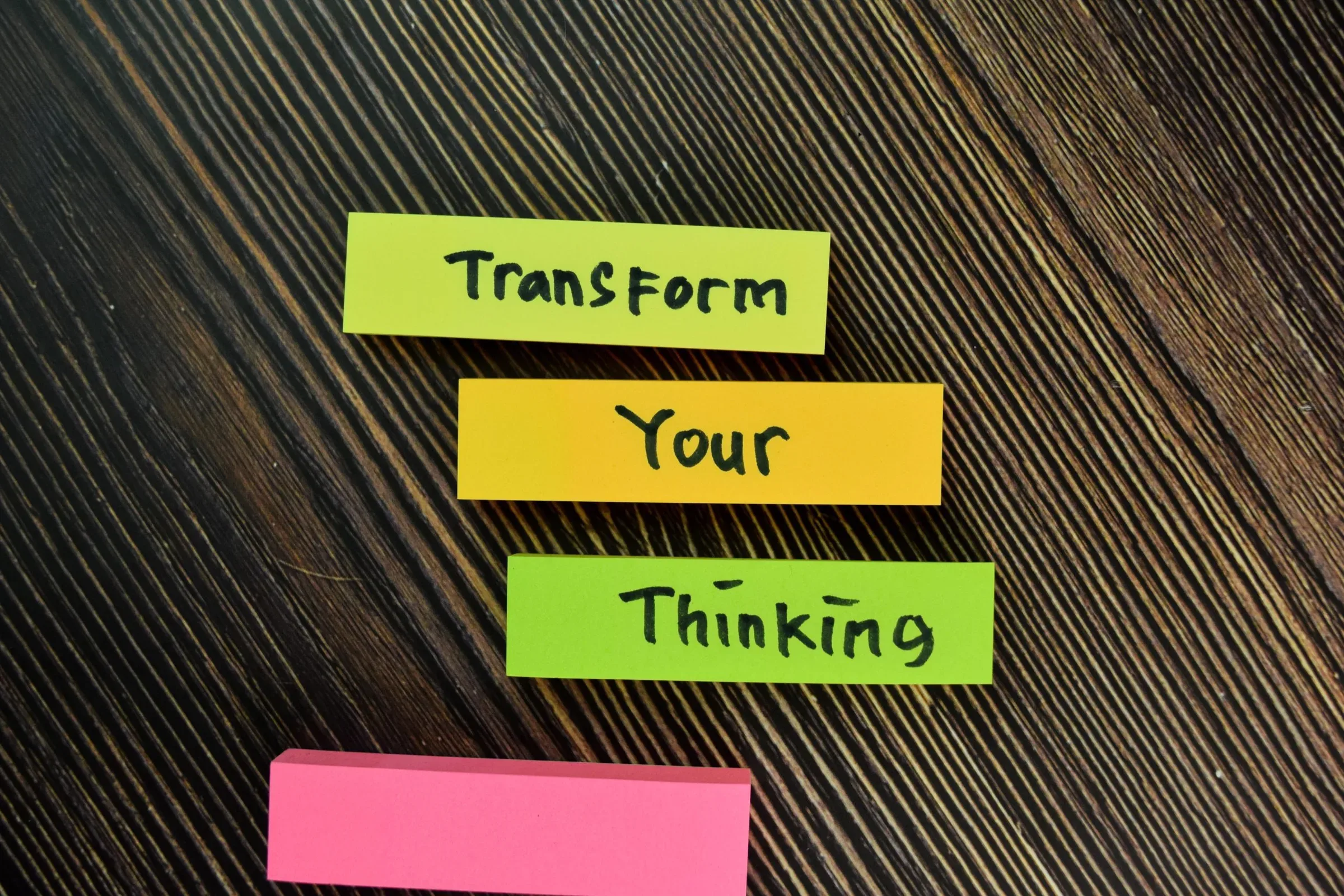 vecteezy transform your thinking written on small notes isolated on wooden table 2219931 scaled